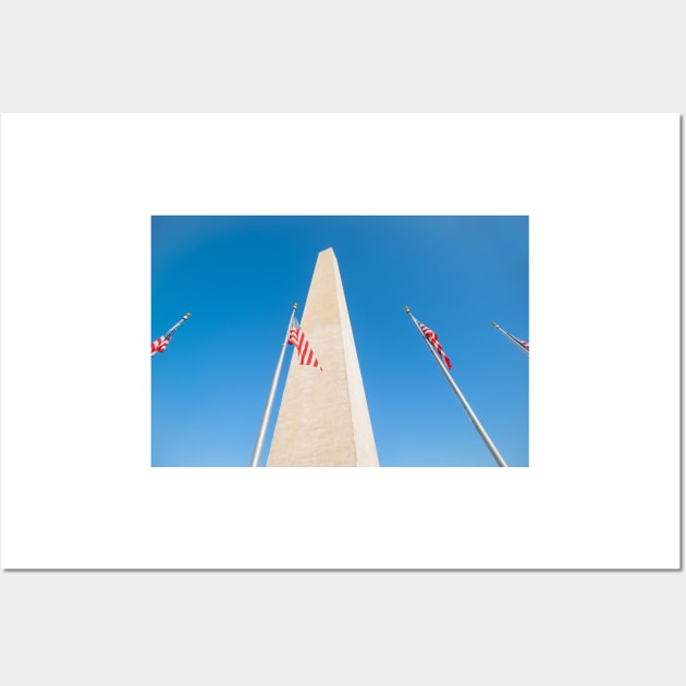 Washington Monument tall obelisk in National Mall Washington DC commemorating George Washington with flags Wall Art by brians101